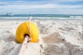 Yellow buoy on the beach for making swimming safety area for tourists