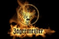 Yellow Burning Flames Effect on JÃÂ¤germeister Icon Logo against black background