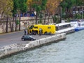 Yellow bus, on a city street in Paris, France, deserted, no tourists, self-isolation, quarantine, stay at home