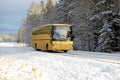 Yellow Bus on Winter Road Royalty Free Stock Photo