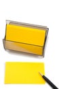 Yellow Business (blank) card on White with pen