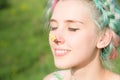 Yellow butterfly sitting on the nose Cute young girl on nature. Harmony and enjoyment in nature Royalty Free Stock Photo