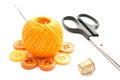 Yellow buttons, scissors, thimble and thread Royalty Free Stock Photo