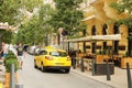 Yellow cab on crowded streets Budapest