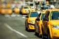 Yellow cab speeds through Times Square in New York, NY, USA.