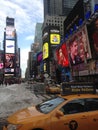 A Yellow Cab on Times Square in Snow in Winter. Royalty Free Stock Photo