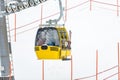 Yellow cable car on Alpine ski slope Royalty Free Stock Photo