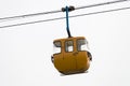 Yellow cable car hanging Royalty Free Stock Photo