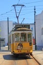 Yellow cable car in lisbon, portugal, on a sunny summer day