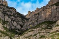 A view of the yellow cable cars climbing Santa Maria de Montserrat abbey in Monistrol, Catalonia, Spain