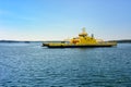 Yellow cable ferry in archipelago