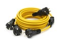 A yellow cable with three plugs on it AI generated Royalty Free Stock Photo