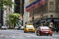 New York, USA June 4, 2023: Taxis, vehicles and American flags Royalty Free Stock Photo