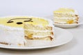 Yellow cake on plate on table