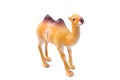 A yellow camel toy with two humps looks realistic