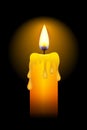 Yellow candle burning Royalty Free Stock Photo