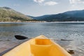 Yellow canoe and row on lake on a sunny day. Summer time and sport concept. Nobody