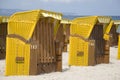Yellow canopied beach chairs at Baltic Sea