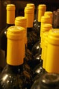 Yellow capsuled bottle necks