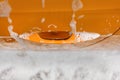 Yellow car door handle covered with shampoo and foam when washed Royalty Free Stock Photo