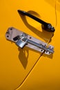 Yellow car door padlocked Royalty Free Stock Photo