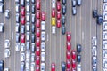 Yellow car in lined up new cars at factory Royalty Free Stock Photo