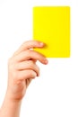 Yellow card in hand
