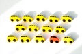 yellow cars and one different color, red car on white background.concept of individuality, leadership and business. Think not like Royalty Free Stock Photo