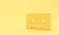 Yellow Cassette Tape on Yellow Background.