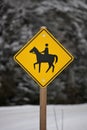 Yellow Caution Horse Riding Sign in a Rural Setting in Winter Royalty Free Stock Photo