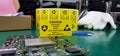 The yellow CAUTION label for Electrostatic Sensitive Devices ESD on static free workstation