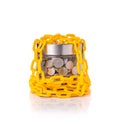 Yellow chain lock around clear glass jar of Thai coin (baht). St