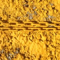 Yellow chain on yellow background Royalty Free Stock Photo