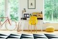 Yellow chair at desk Royalty Free Stock Photo