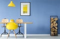 Yellow chair and hanging lamp