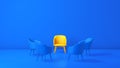 The Yellow Chair Stands Out From the Crowd of Blue Chairs Against on a Blue Studio Background.