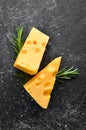 Yellow cheese with holes. Dairy products. Royalty Free Stock Photo