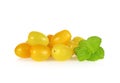 Yellow cherry tomatoes on white background