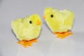 Yellow chickens on a white background. Chickens toy clockwork