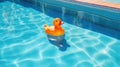 Yellow child's toy rubber ducky toy floating in a large clear blue swimming pool - generative AI