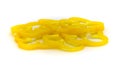 Yellow chilli slices separated on a white background