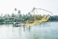 Yellow Chinese fisher net along the kollam kottapuram waterway Royalty Free Stock Photo