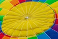 Close-up of the top of a multi-colored hot air balloon