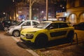 Yellow Citroen Cactus car parked on French street