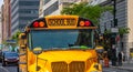 Yellow classic public school bus on the street, New York, Manhattan downtown Royalty Free Stock Photo
