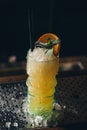 Yellow cocktail decorated with mint leaf Royalty Free Stock Photo