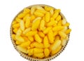 Yellow cocoons in basket