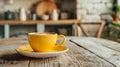 Yellow coffee cup on rustic wooden table Royalty Free Stock Photo