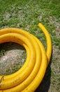 Yellow coil land drainage pipe on the ground