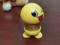 A yellow color dancing doll
